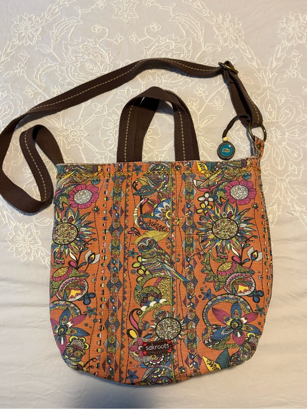 Sakroots Orange Floral & Bird Crossbody Tote